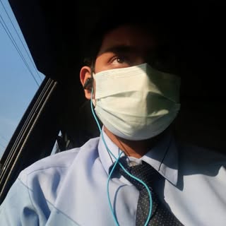 Arnab smiling in profile picture